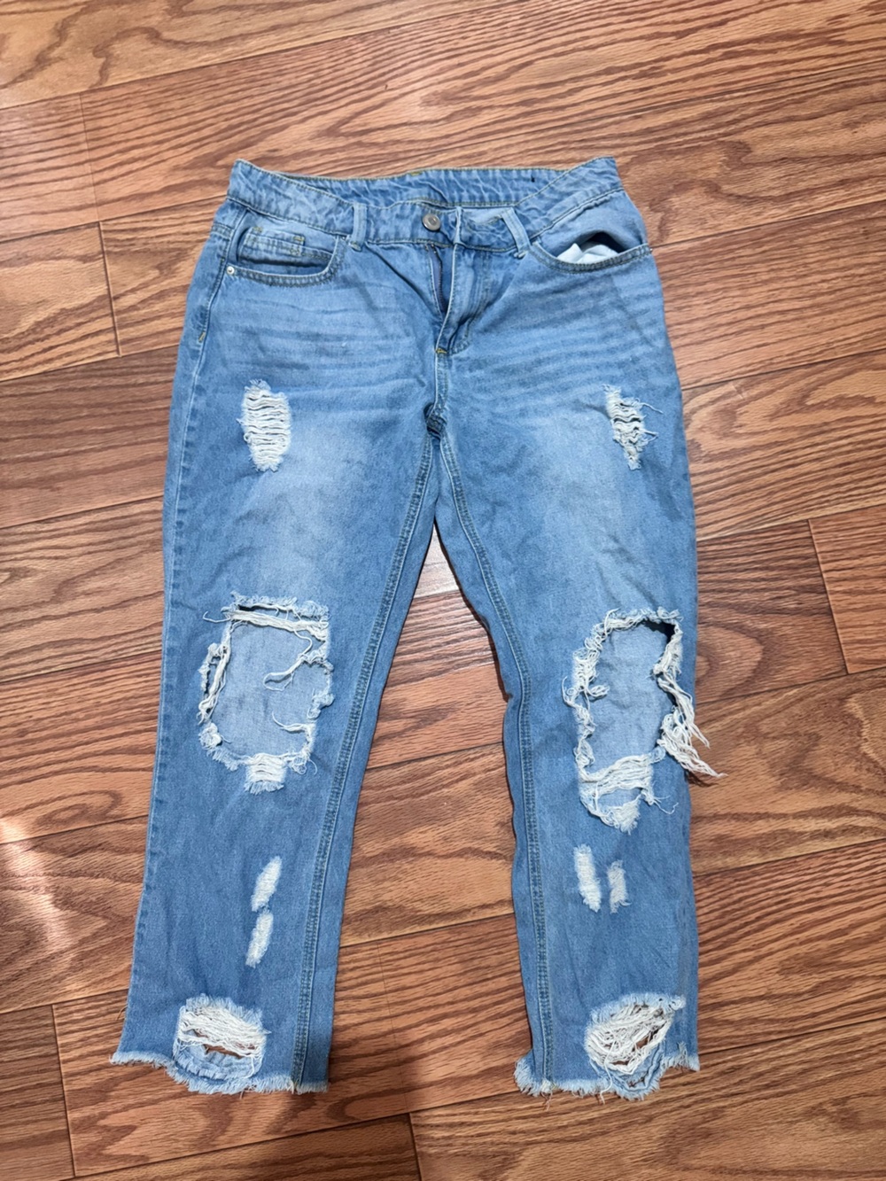 Women’s Distressed Light Blue Mid-Rise Jeans